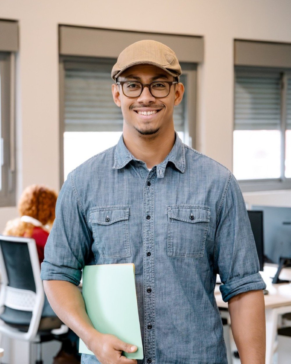 Portrait Of A Man Smiling While Posing In The Offi 2024 12 03 15 32 36 Utc